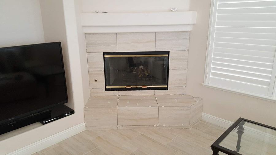 Subway tile backsplash mid-installation
