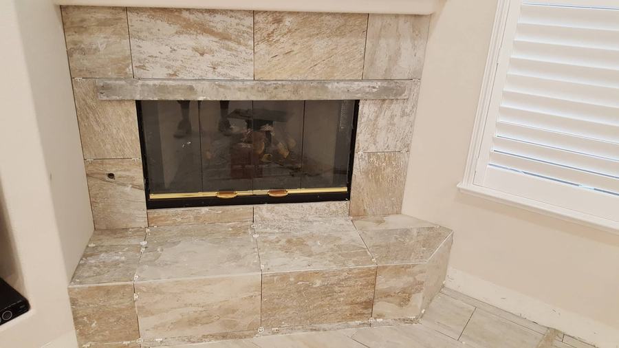 Travertine tile fireplace surround